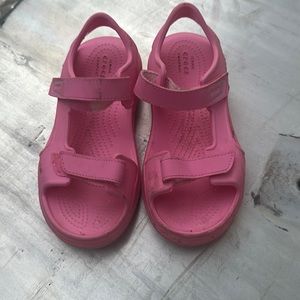 Crocs size j 2.  Just need to be cleaned.